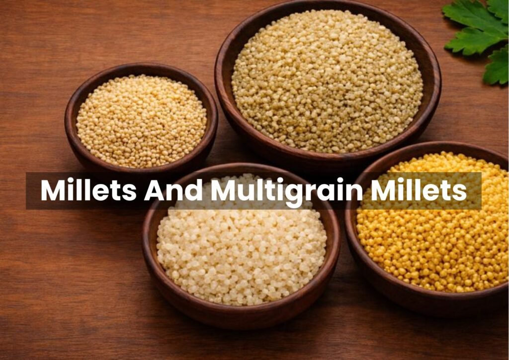 Millets and multigrain millets displayed in wooden bowls including foxtail millet, pearl millet, and finger millet on a wooden background.